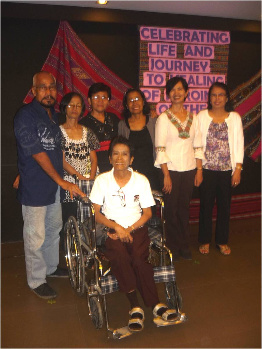 Balay honors women survivors of torture (third from left to right: May Rodrigquez, Hilda Narcisso, Mel Laurenaria and Minda Upalda). Women who have greatly contributed to Balay's work were likewise honored (left to right: Inda Olayer represented by her husband Jojo, Daisy Valerio; bottom: Agnes Rio)